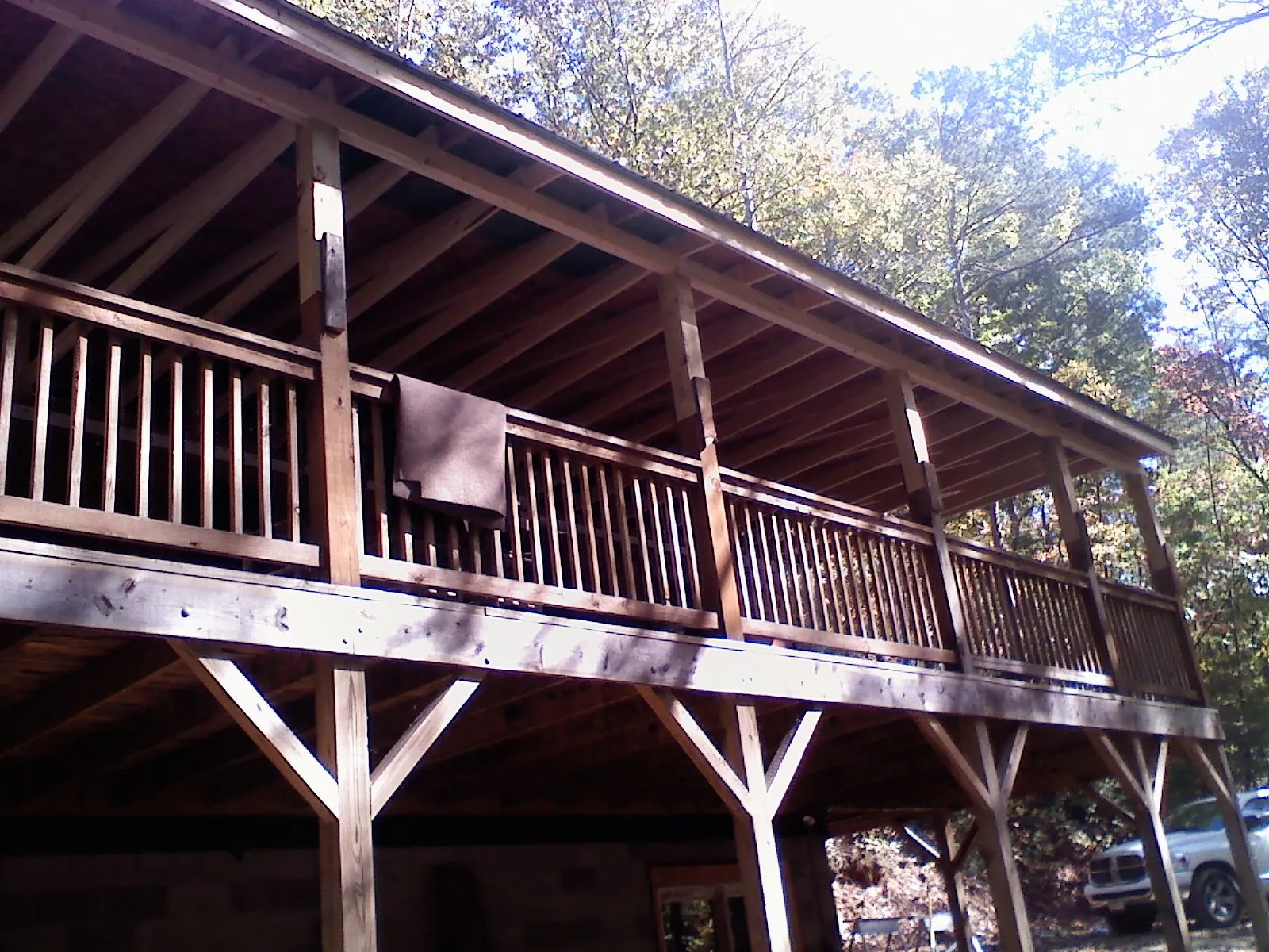 Timber framing under a new elevated porch and deck — Roof Leak Repair in Idaho Falls by Roofing Brothers